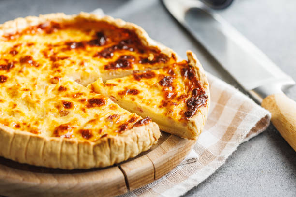 istock Traditional french pie. Quiche lorraine on kitchen table. 2060294012