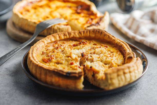 istock Traditional french pie. Quiche lorraine on kitchen table. 2060294552