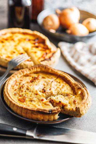 istock Traditional french pie. Quiche lorraine on kitchen table. 2060294578