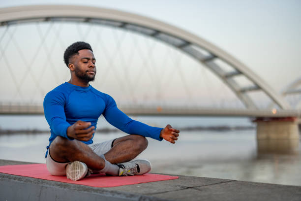 istock Man meditating in lotus position 2060295717