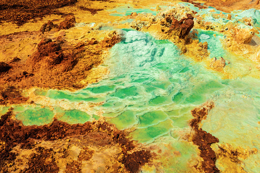 Colorful abstract apocalyptic landscape like moonscape of Dallol Lake in Crater of Dallol Volcano, Danakil Depression, Afar Triangle Ethiopia