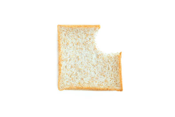 istock Biting pieces Whole Wheat bread sliced on white background, whole grain bread, 2060313393