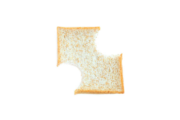 istock Biting pieces Whole Wheat bread sliced on white background, whole grain bread, 2060313394