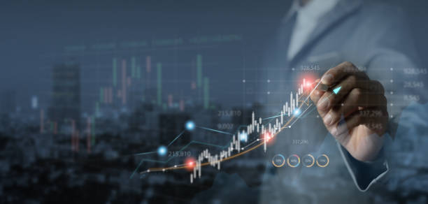 istock Financial analyst analyzes stock trading charts Economic growth charts, planning, ideas, business, finance and investing. 2060338843