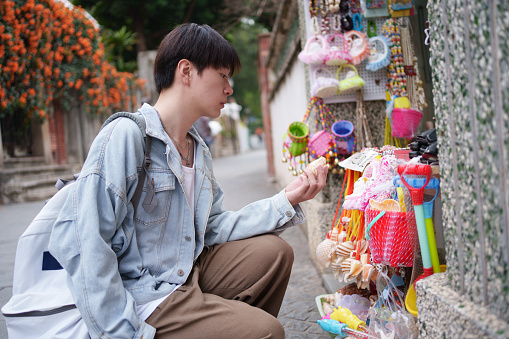 Young tourists choosing products