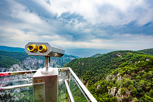 Glass terrace and tourist binoculars overlooking the Şahinderesi canyon in the Kaz Mountains