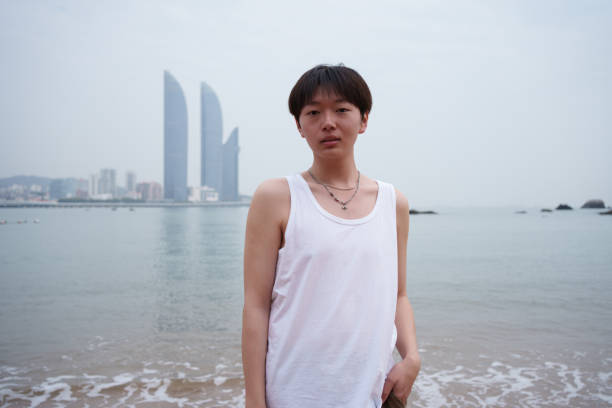 Asian young man at the beach