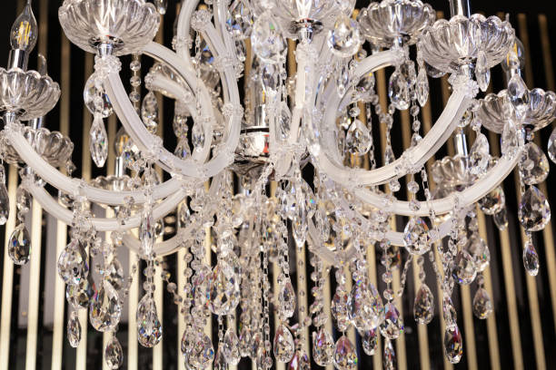 istock A white crystal chandelier hangs from the ceiling, close-up. 2060355295