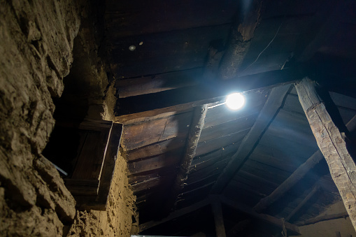 First Light: A bulb illuminates rural life in an Uttarakhand village, India.