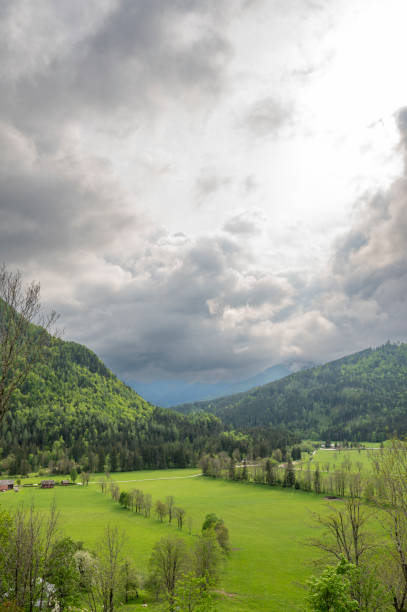 Zgornje Jezersko valley in Slovenia during a beautiful springtime day with the mountain range in the Kamnik–Savinja Alps.