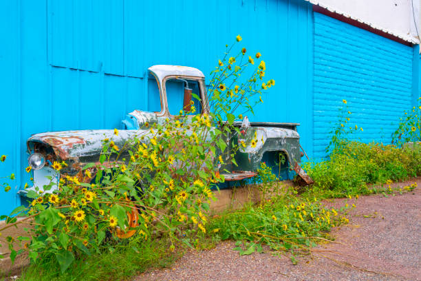Seligman, Arizona, United States - September 22, 2023: Wall Decoration by Half of a Car
