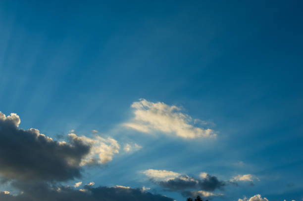 istock Clouds and sunlight against the backdrop of the sky in the evening. 2060424692