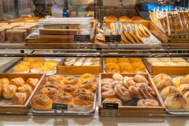 istock Assorted pastry and bread arranged on tray selling at bakery shop. 2060431057
