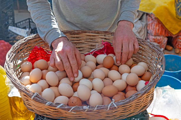 istock A man selling eggs in a basket in the market. 2060437044