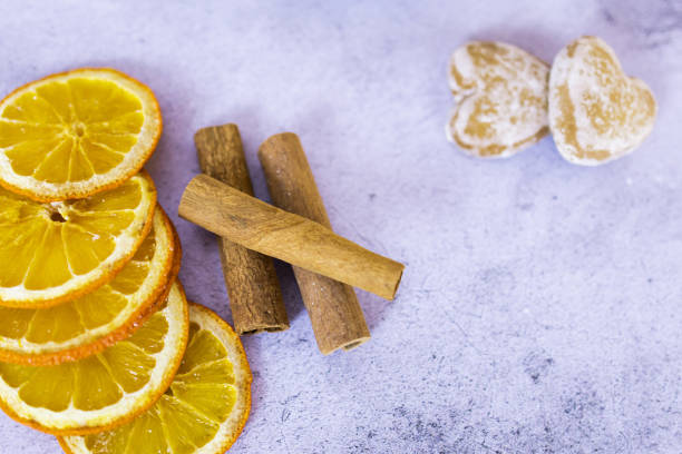 Slice Candied Oranges , Cinnamon sticks and Star Anise on Rustic Background
