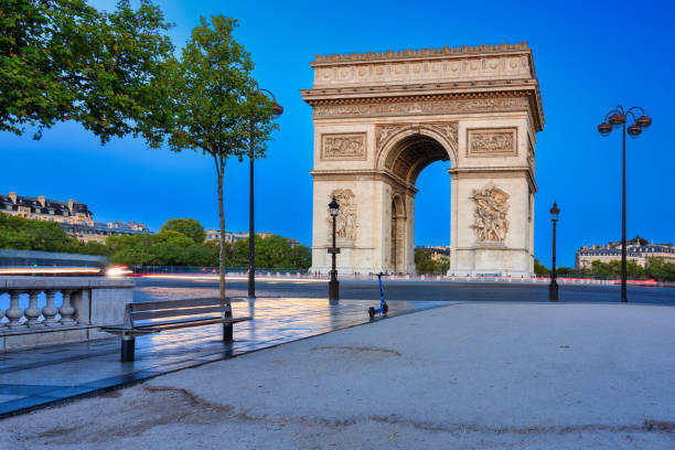 the arc de triomphe at the centre of place charles de gaulle in paris. france - paris france night charles de gaulle arc de triomphe стоковые фото и изображения