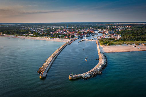 Beautiful sunrise over the Ustka harbour by the Baltic Sea, Poland.