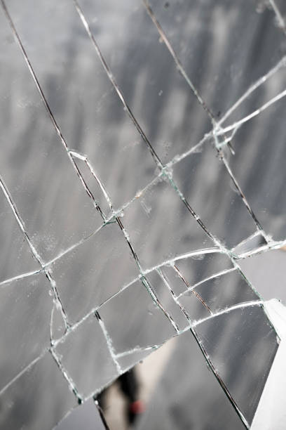istock cracks texture of broken mirror, glass, Metaphor for shattered, Broken Dreams, Artistic Representation of Fragility, Safety Hazards in Home Décor, Environmental Concerns 2060487886