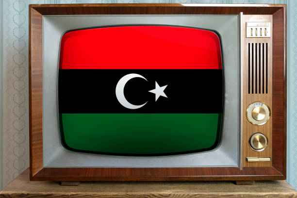 national flag Libya on screen, stylish interior technology 60s, concept eternal values on television, global world trade, politics, retro technologies, news
