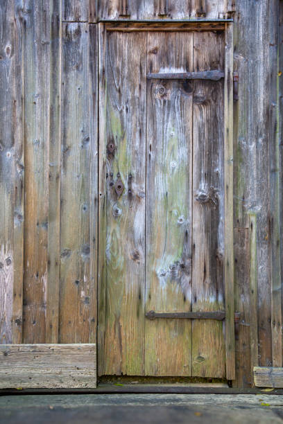 Old dirty wooden barn door
