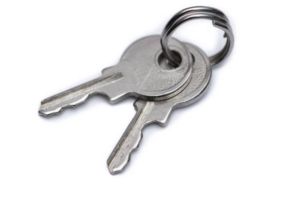 Two house key on white background