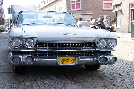 Old American grey car, vintage 1959 Cadillac Eldorado Biarritz, cabriolet Oldtimer car, retro-style, Hague, Netherlands - September 12, 2023