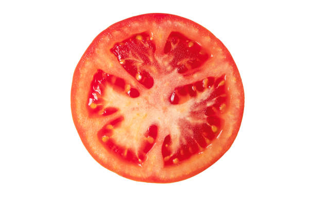 istock Tomato slice top view isolated on white 2060550967