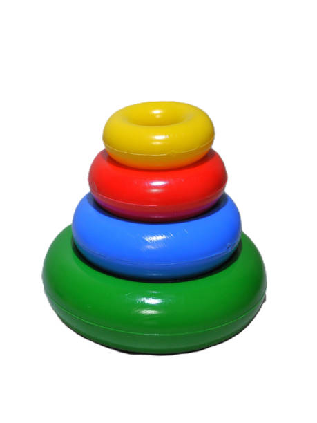 istock children's plastic toy pyramid with round multi-colored parts on a white background, no background 2060584695