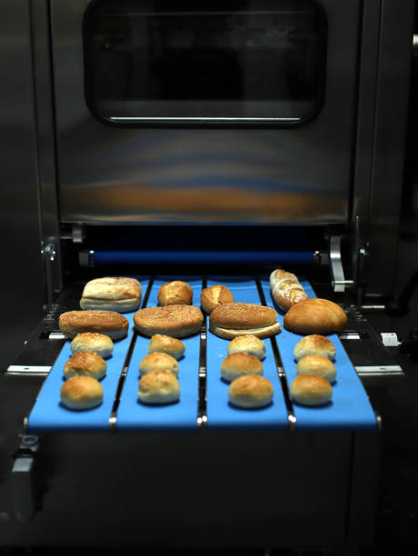 istock pastry products in industrial machine 2060596985