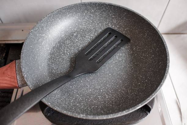 istock A non-stick Teflon frying pan with a plastic spatula on the stove 2060601580