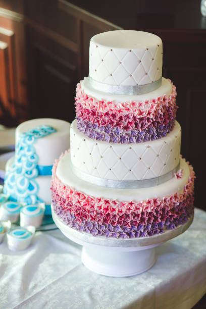 istock Wedding cake with cupcakes at the exhibition 2060610696