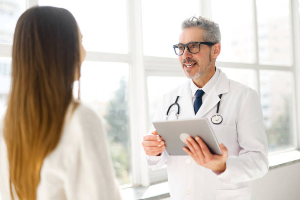 istock A conversation between a healthcare professional and a patient during appointment 2060619192