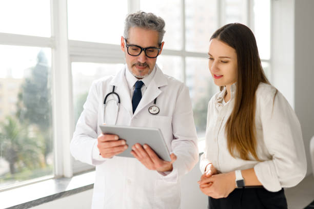 istock A conversation between a healthcare professional and a patient during appointment 2060619200