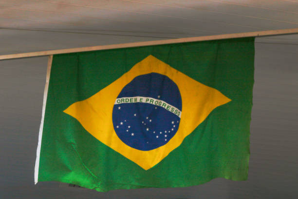 istock Dirty Brazil Flag at Strong Wind 2060623136