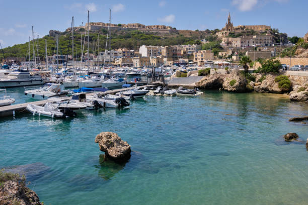 Marina - Mgarr Mooring boats and yachts on the island of Gozo - Mgarr, Malta mgarr malta island gozo cityscape with harbor stock pictures, royalty-free photos & images