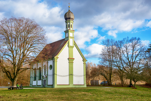 Munich, Bavaria / Germany - July 13, 2020: View on the so-called Monopteros at a sunny summer day. Located inside Englischer Garten, the largest park of Munich.