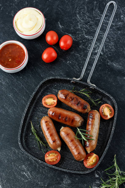 istock Grilled Mini Sausages with Rosemary and Tomato 2060655318