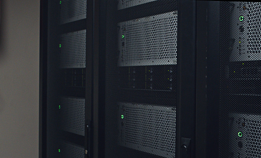 Computer engineering, data centre or hardware in server room or cyber security for protection of company. Business, IT support or modern high tech internet information and rows of racks with network