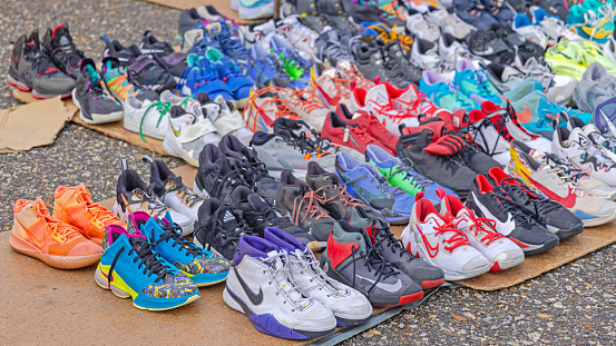 Belgrade, Serbia - February 10, 2024: Second Hand Shoes Sneakers Sports Footwear at Flea Market Bubanj Potok.