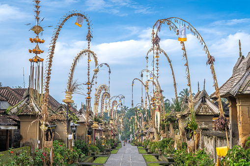 Penglipuran Traditional Village decorated with penjors for Galungan, Bali Indonesia