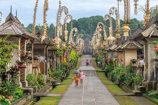 Penglipuran Traditional Village decorated with penjors for Galungan, Bali Indonesia