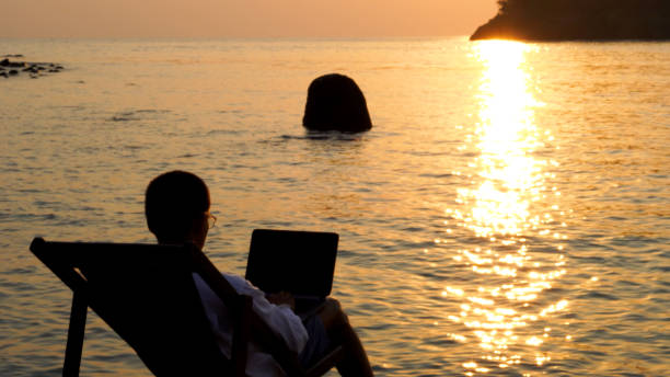 istock Busy freelance man with laptop outdoor. 2060689367
