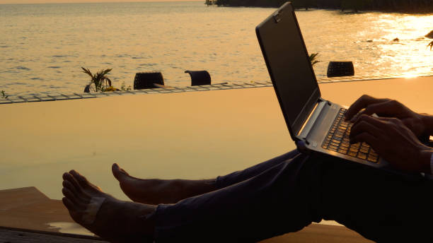 istock Busy freelance man with laptop outdoor. 2060689893