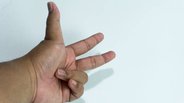 istock Hand with three fingers pose isolated on white background 2060694124