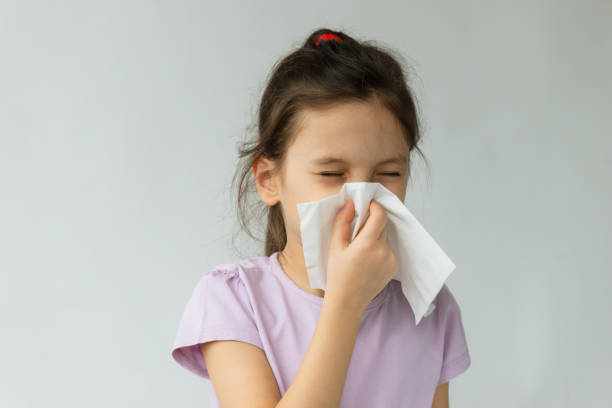 istock Little Girl Cleaning Her Nose 2060706926
