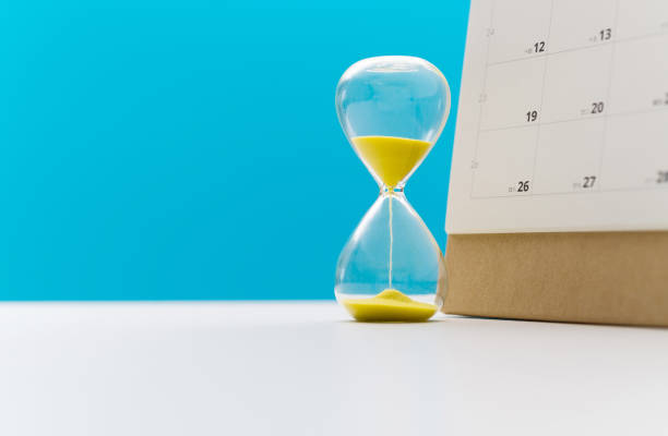 istock Calendar and hourglass on the table 2060724189