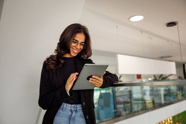 istock Young woman enjoys social media 2060746997