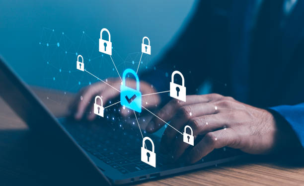 istock Digital security concept with hands on a laptop and floating padlocks, depicting cybersecurity and data protection. login and password, data protection and secured internet access. 2060749050