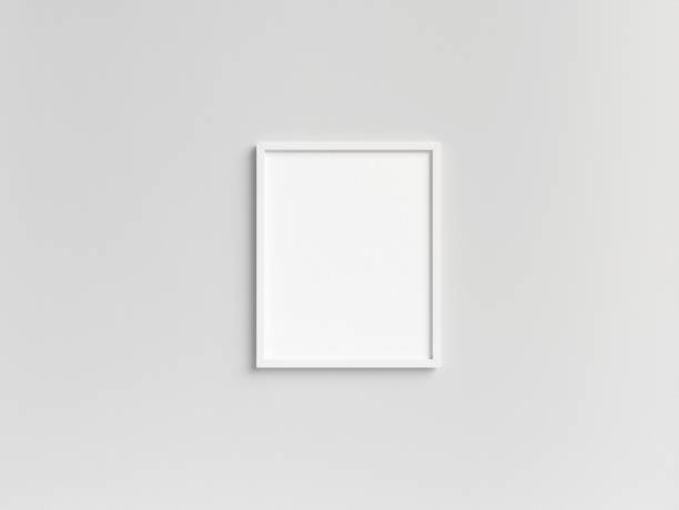 istock Empty 8x10 white photo frame template hanging on the wall 2060751059