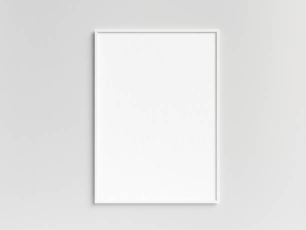 istock Empty white photo frame template hanging on the wall 2060751242